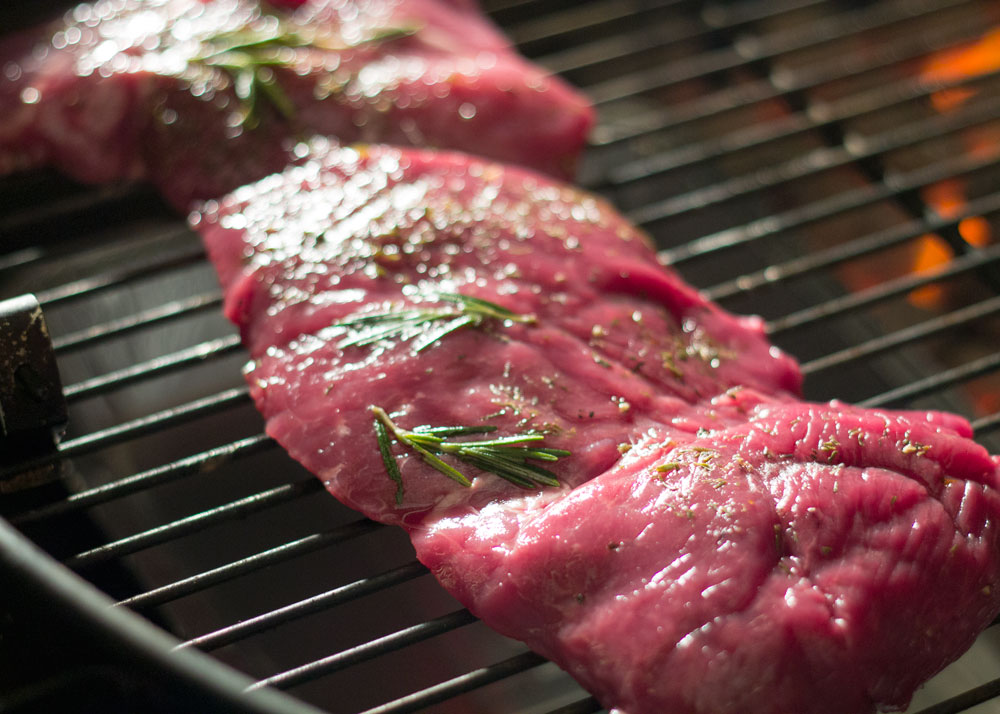 Butterfly lamb on outlet grill